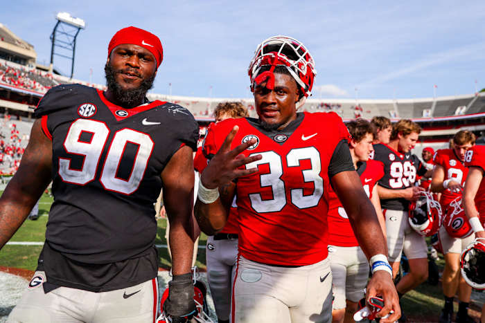 Georgia defensive lineman Tramel Walthour (90), Georgia inside linebacker C.J. Allen (33) after Georgia’s annual G-Day scrimmage on Dooley Field at Sanford Stadium in Athens, Ga., on Saturday, April 15, 2023. (Tony Walsh/UGAAA)